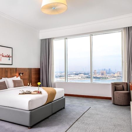 Somerset West Bay Doha Luaran gambar A bedroom at the hotel