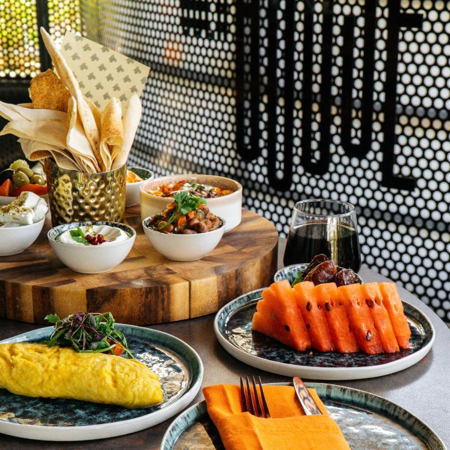 Somerset West Bay Doha Luaran gambar A selection of dishes at the restaurant