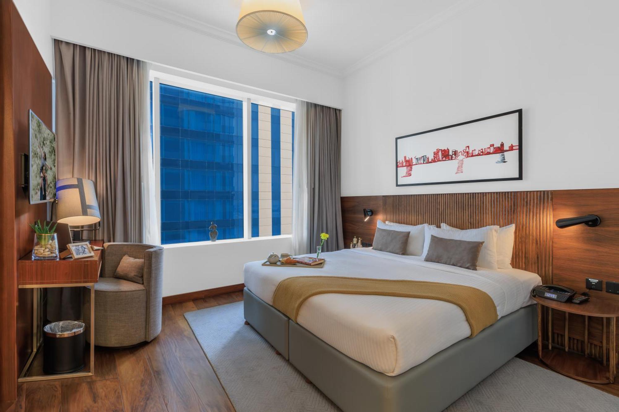 Somerset West Bay Doha Luaran gambar A bedroom at the hotel